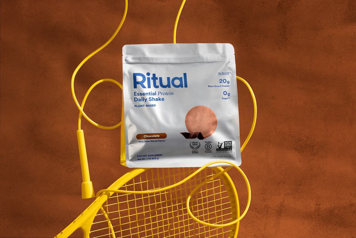 Ritual Chocolate Protein with workout equipment